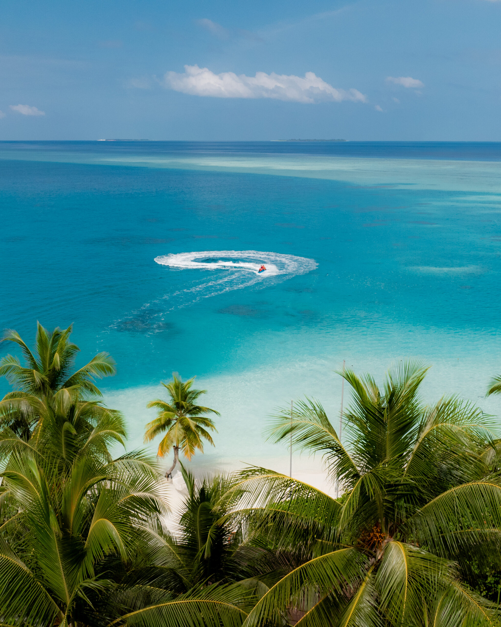 Siyam World Maldives lagoon watersports and island view