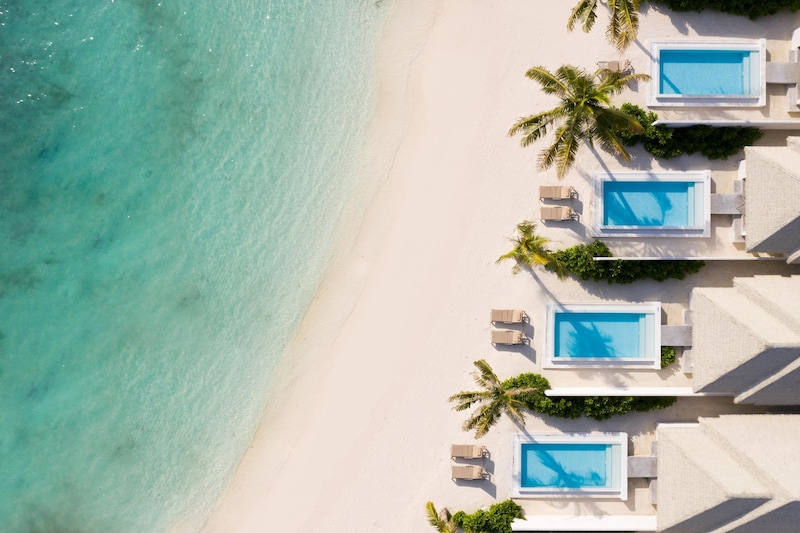 Sun Siyam Vilu Reef Maldives beach villa pool and island aerial view