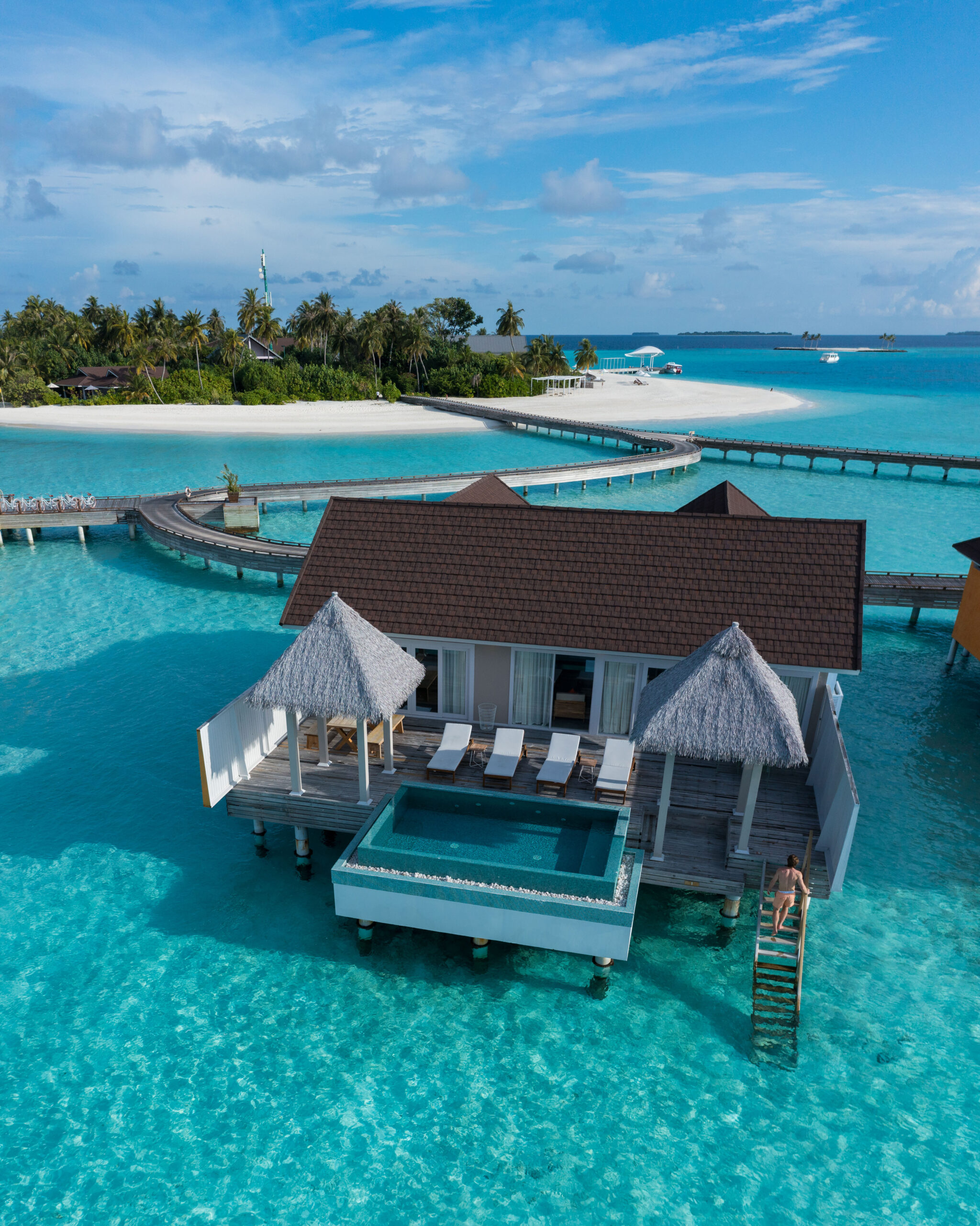 The Standard Huruvalhi Maldives overwater residence with private pool and lagoon view